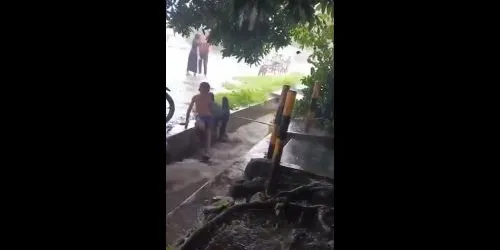 Kid gets swept away by drain current while playing during heavy rain - update11111