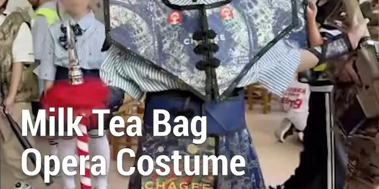 A mom’s delicate Chinese opera costume made entirely out of upcycled milk tea takeaway bags for her son’s graduation runway show...